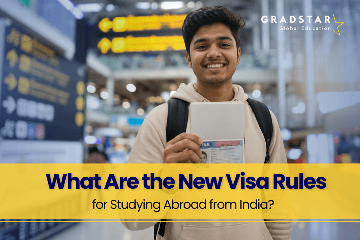 An Indian student is holding his visa after new visa rules in India