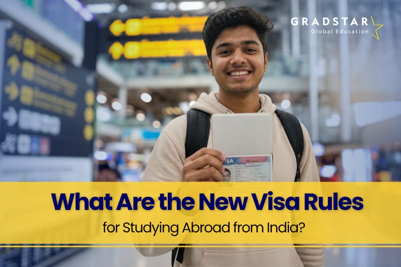 An Indian student is holding his visa after new visa rules in India